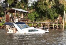 EL AGUA TAPO UN SPORT CRUISER EN EL RÍO SARMIENTO